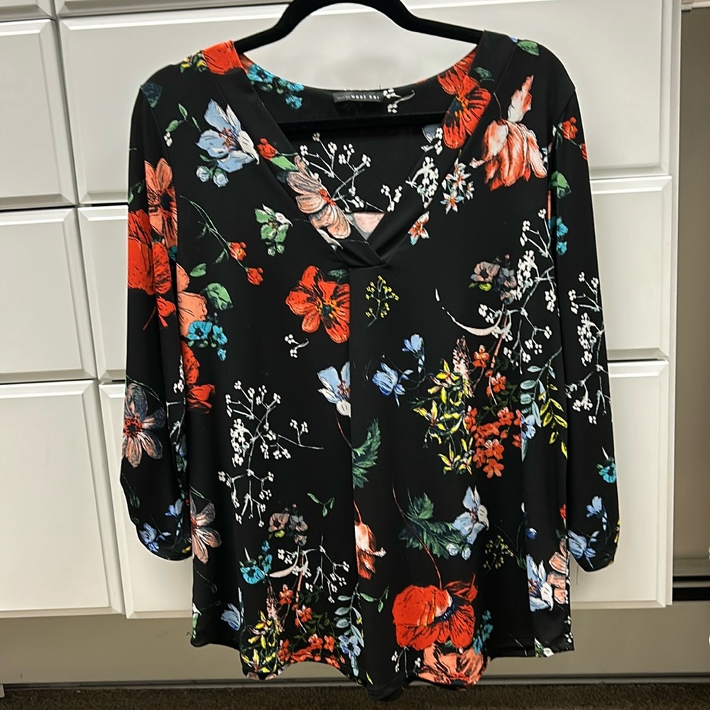 Black floral blouse. West Kei size large.